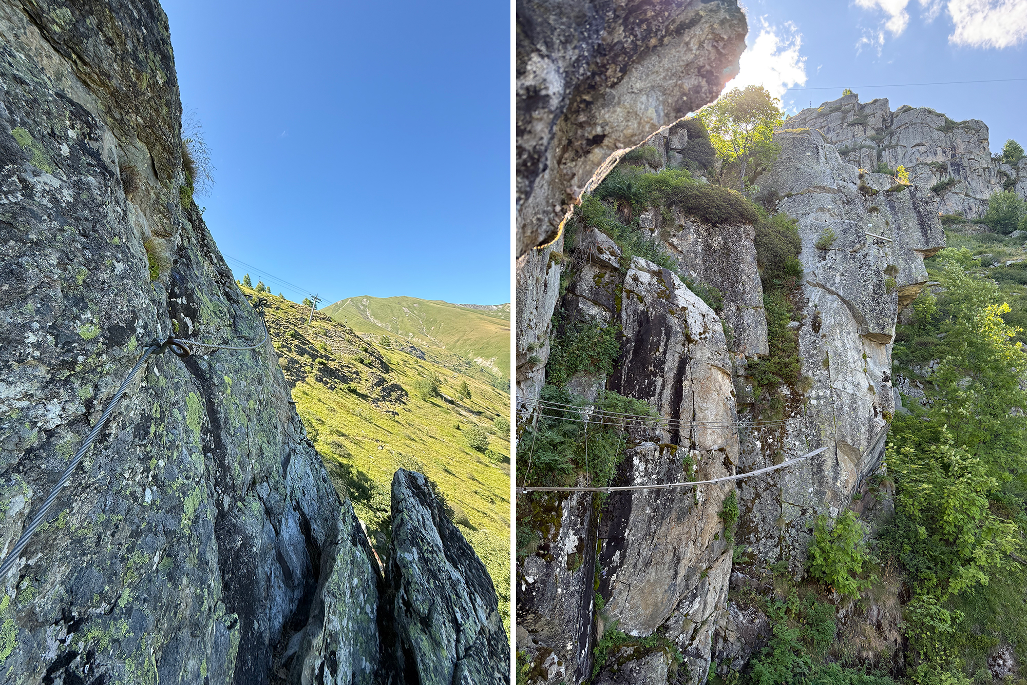 Two rocky cliff faces with steel cables running along them, set against a clear blue sky and grassy slopes in the distance (via ferrata setup).