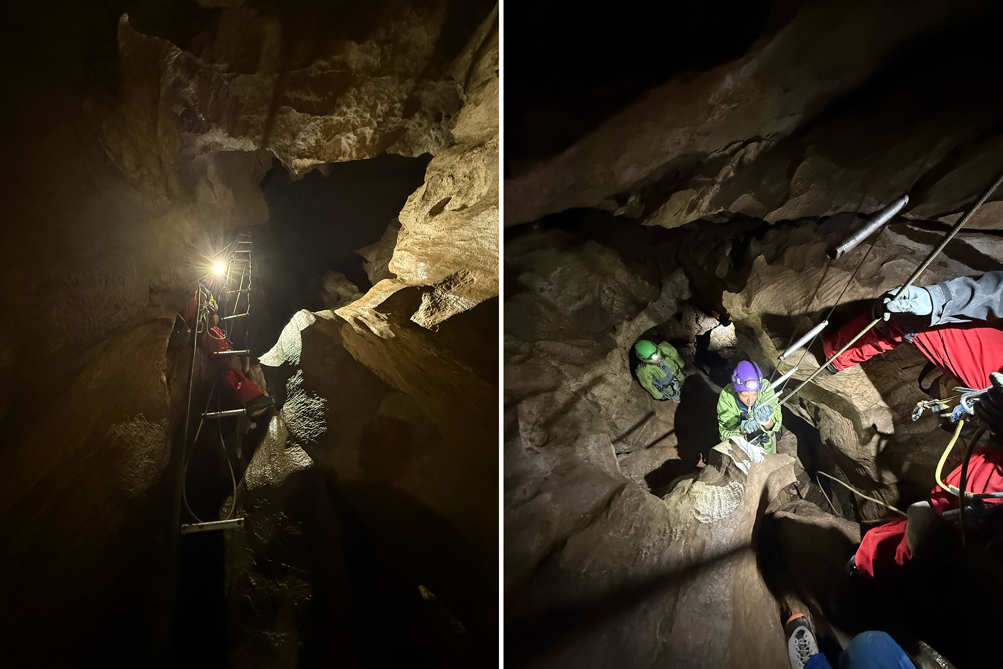 Group of climbers in helmets and protective gear descending a rocky cave using ropes and ladders in a dark chamber.