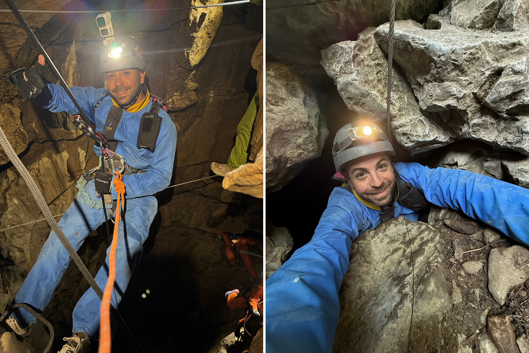 Two spelunkers in a rocky cave wearing helmets with headlamps, safety harnesses, and ropes as they climb.